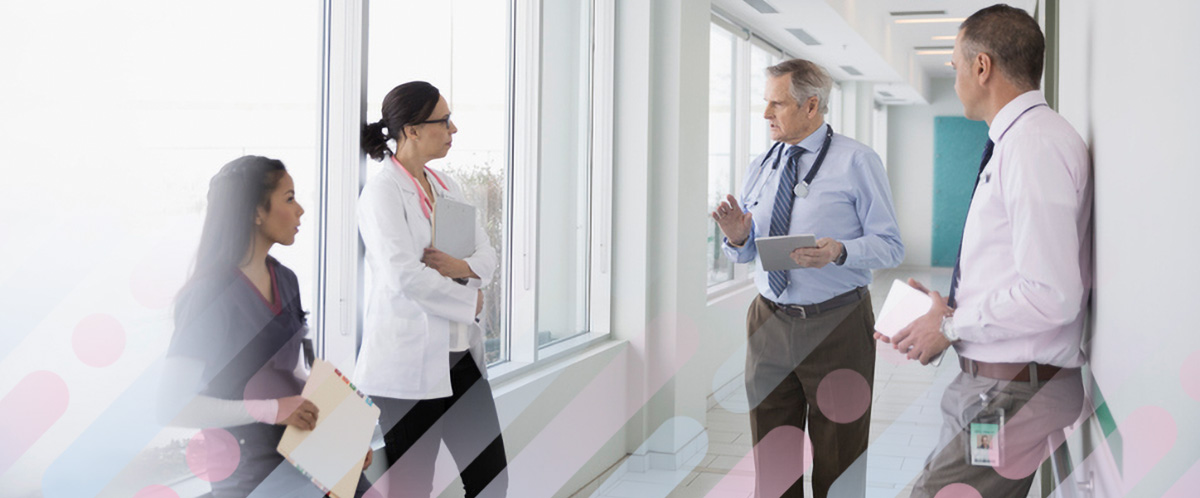 A patient discusses breast cancer treatment options with a medical team