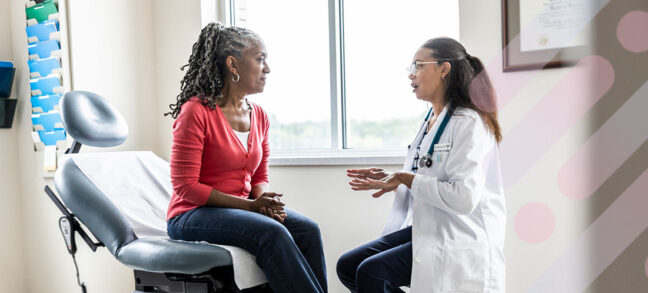 A surgeon consults with a woman about her mastectomy treatment plan